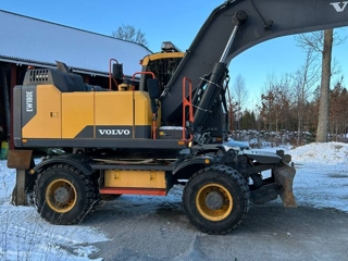 Volvo EW180E + Palmse trailer + redskap